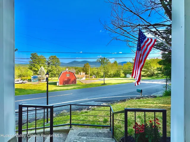 a view of a street with an outdoor space