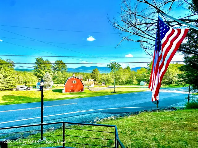 a view of an outdoor space and basketball court