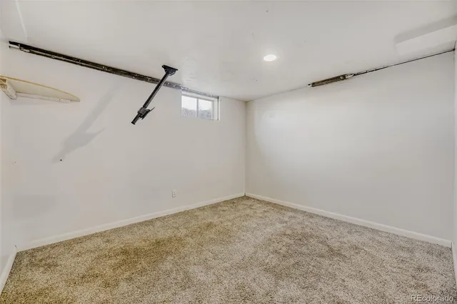 a bathroom with a sink a mirror and a shower