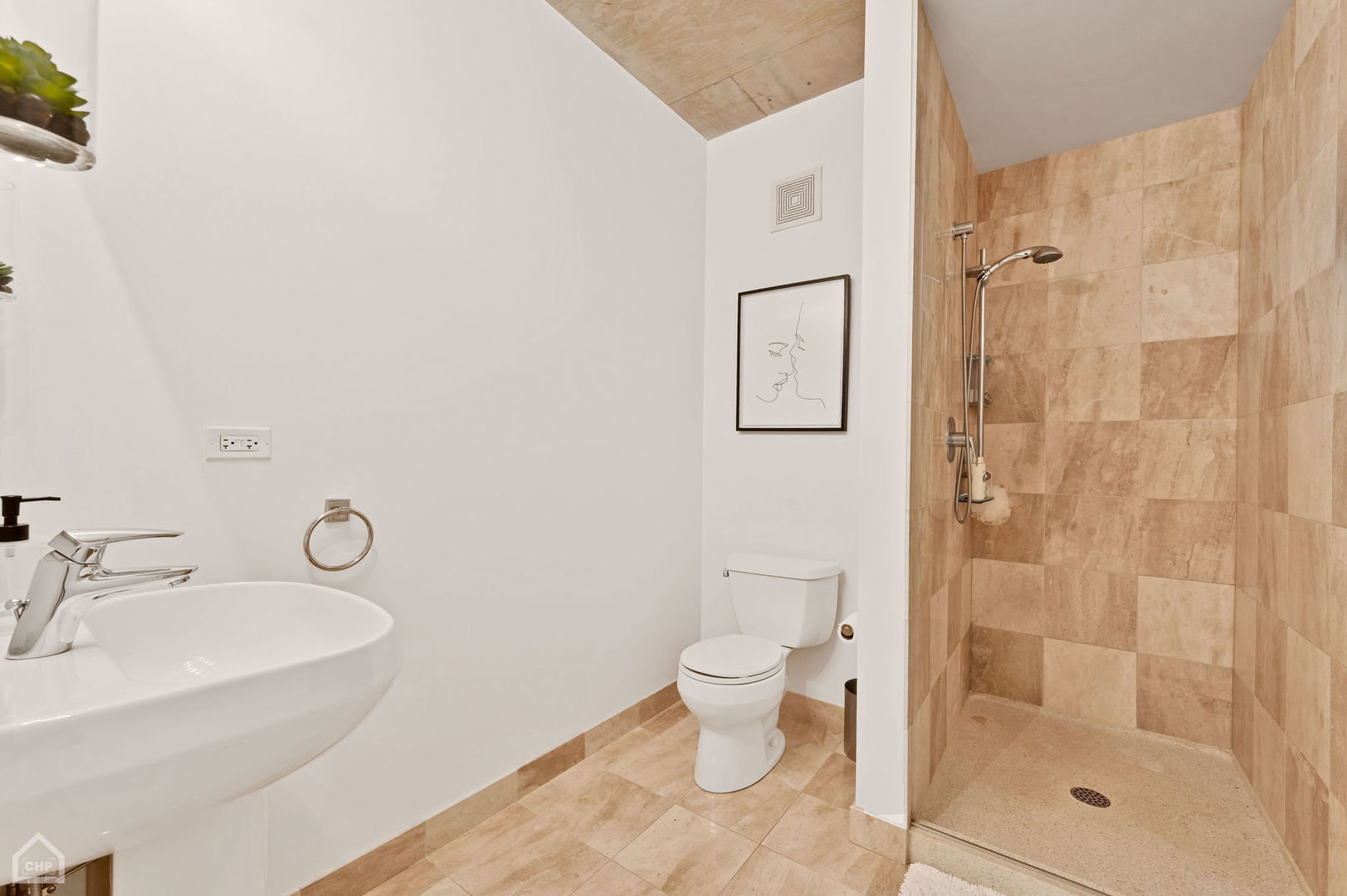 611 South Wells Street, Unit 904 Chicago, IL 60607 - Photo 13 of 17 a bathroom with a granite countertop sink toilet and shower
