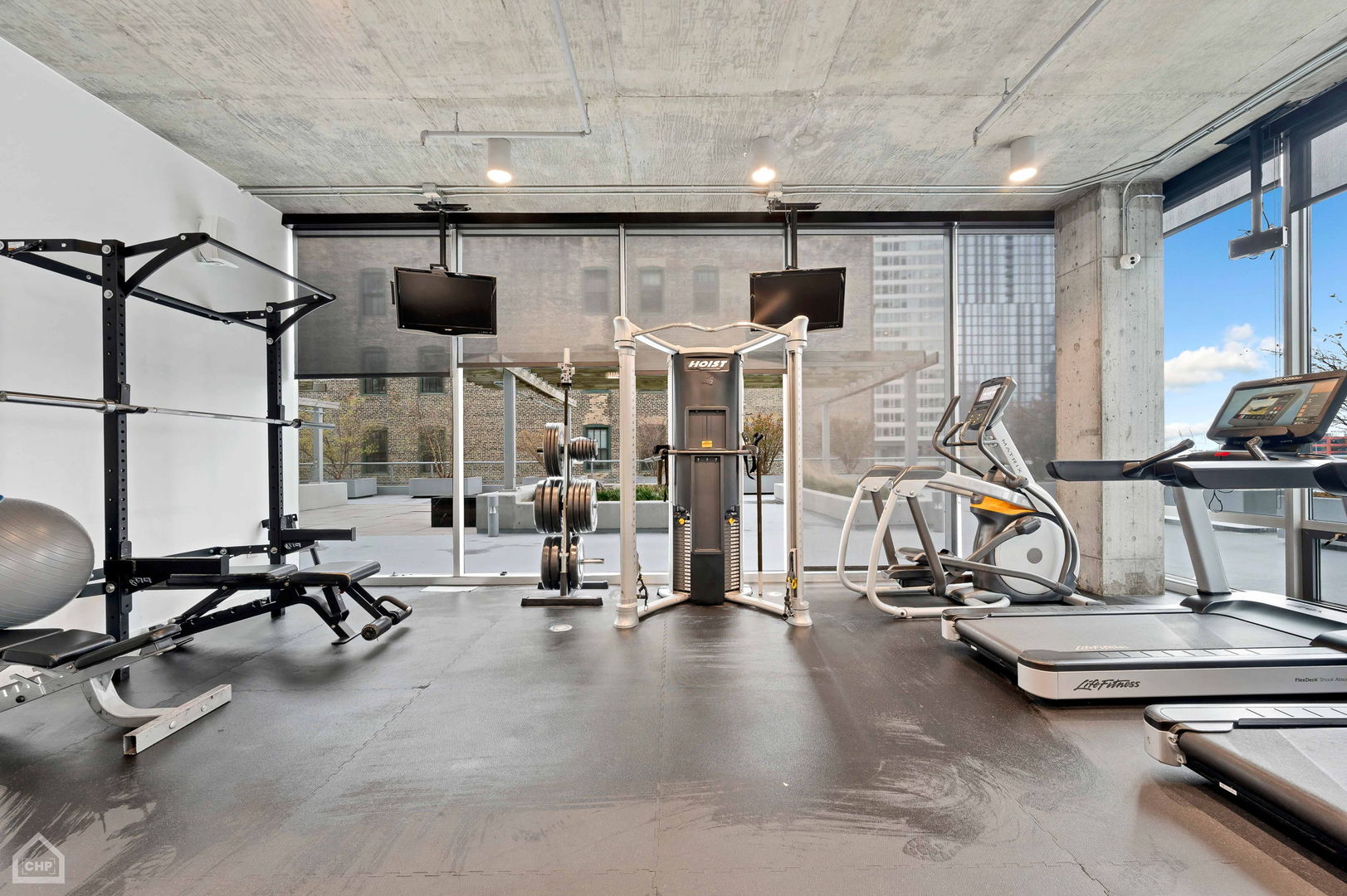 611 South Wells Street, Unit 904 Chicago, IL 60607 - Photo 17 of 17 a view of a room with gym equipment