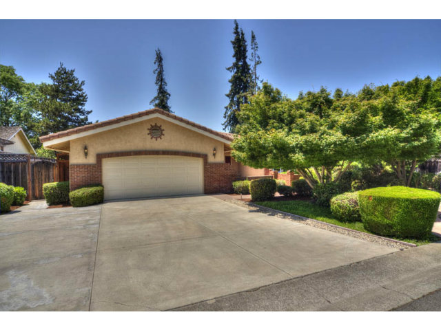 763 Filip Road Los Altos, CA 94024 - Photo 1 of 25 a front view of a house with a yard and garage