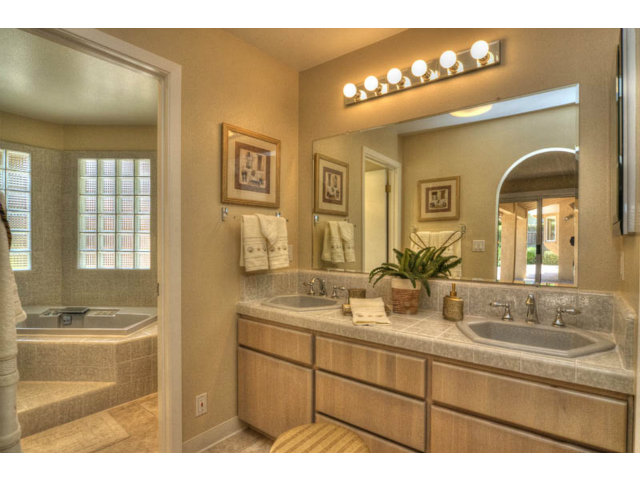 763 Filip Road Los Altos, CA 94024 - Photo 14 of 25 a bathroom with a sink double vanity and a mirror