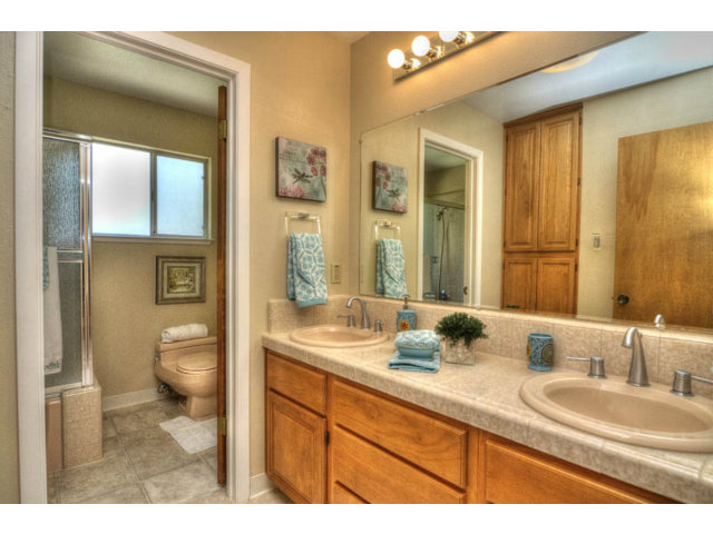 763 Filip Road Los Altos, CA 94024 - Photo 17 of 25 a bathroom with a granite countertop sink toilet and shower