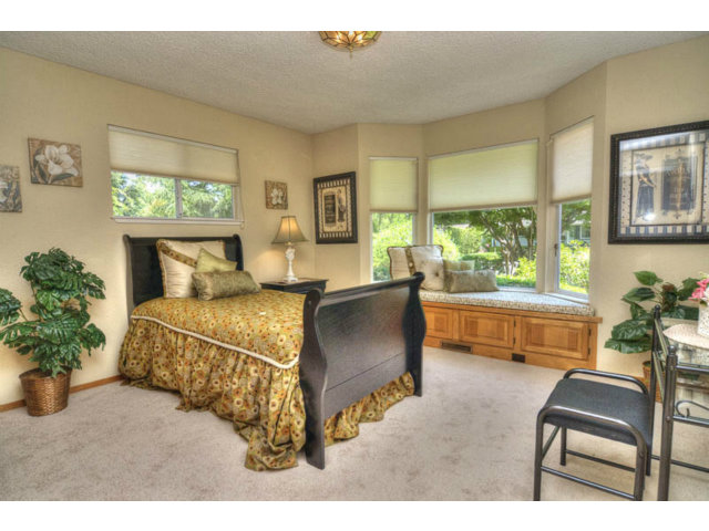 763 Filip Road Los Altos, CA 94024 - Photo 18 of 25 a bedroom with furniture and a large window