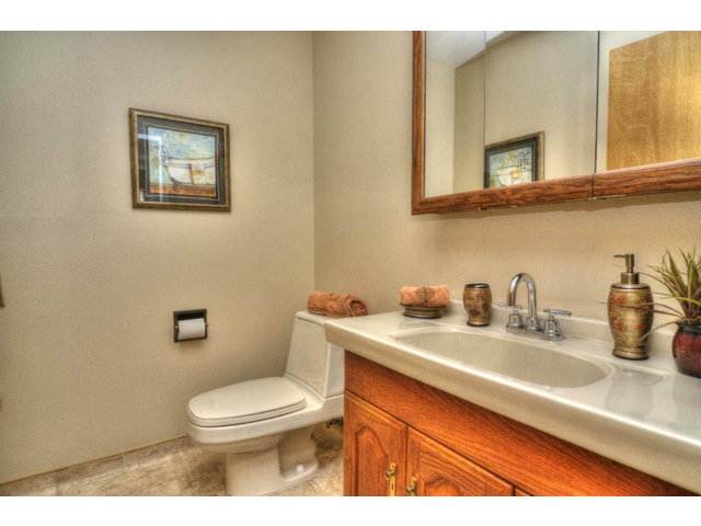 763 Filip Road Los Altos, CA 94024 - Photo 20 of 25 a bathroom with a toilet a sink and mirror