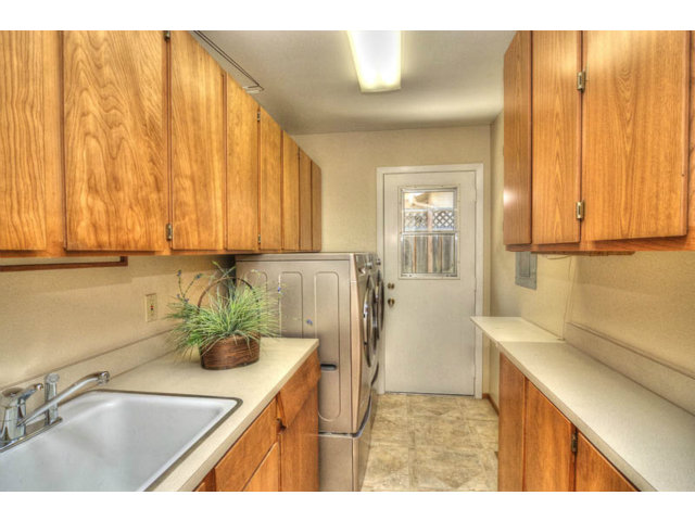763 Filip Road Los Altos, CA 94024 - Photo 21 of 25 a kitchen with a sink and cabinets