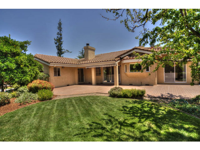763 Filip Road Los Altos, CA 94024 - Photo 22 of 25 a front view of a house with a garden