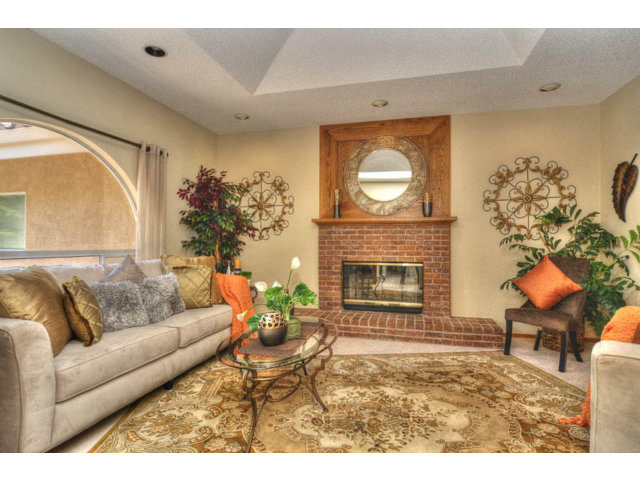 763 Filip Road Los Altos, CA 94024 - Photo 3 of 25 a living room with furniture and a fireplace