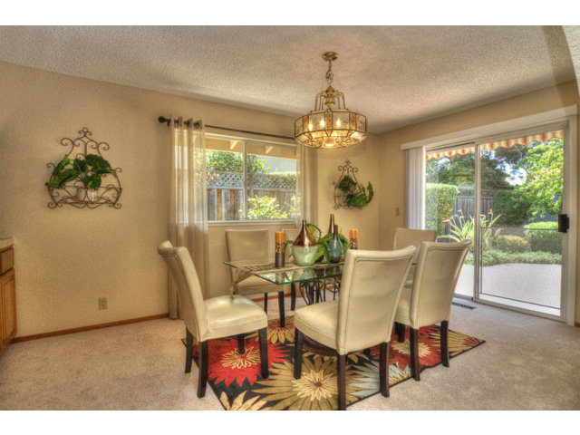 763 Filip Road Los Altos, CA 94024 - Photo 5 of 25 a view of a dining room with furniture wooden floor and chandelier