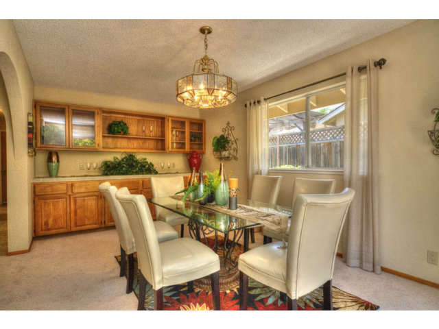 763 Filip Road Los Altos, CA 94024 - Photo 6 of 25 a view of a dining room with furniture a chandelier and wooden floor