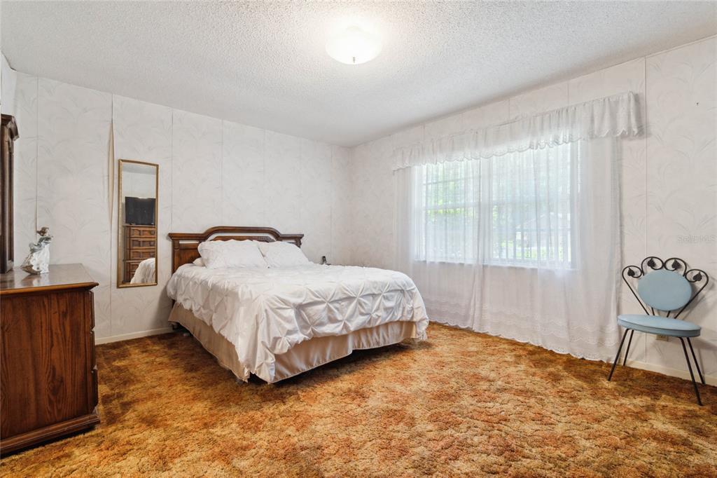 1470 Ridgewood Street DeLand, FL 32720 - Photo 15 of 32 Primary bedroom