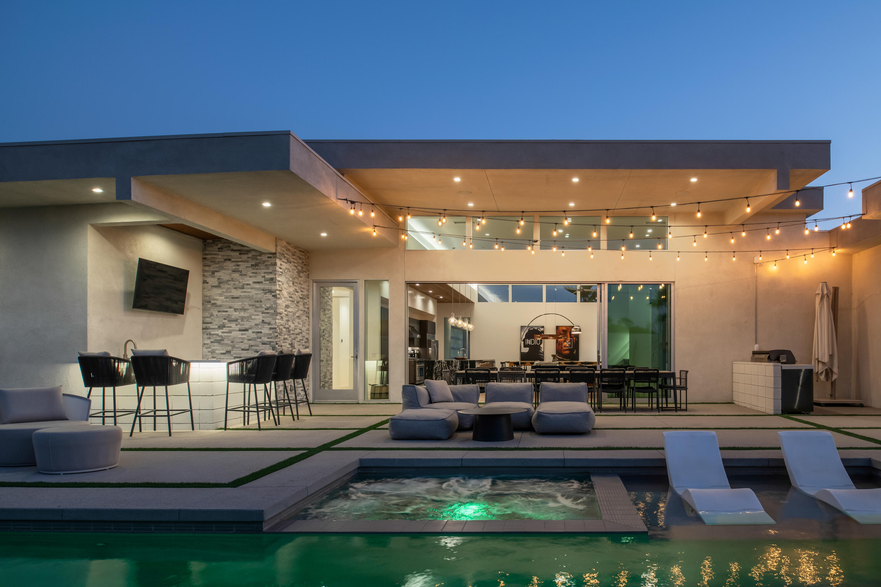 80904 Elemento Lane Indio, CA 92201 - Photo 1 of 36 a swimming pool with outdoor seating and yard