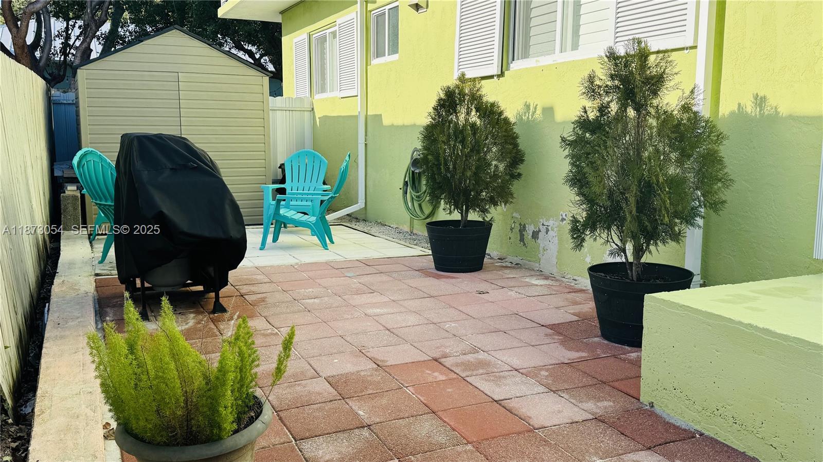 443 4th Road Key Largo, FL 33037 - Photo 14 of 17 a view of a chairs and table in the patio