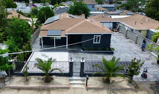 an aerial view of a house with garden