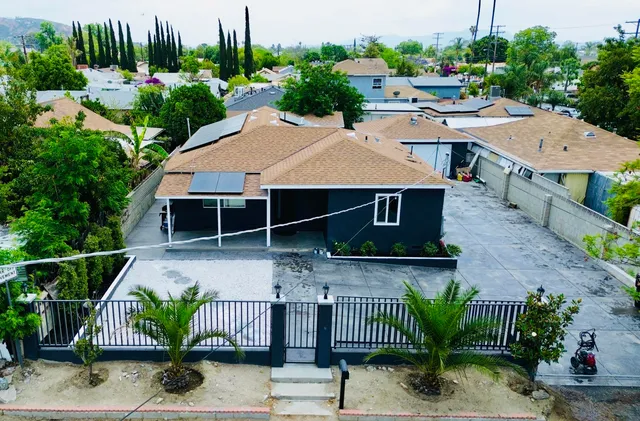 a house with trees in the background