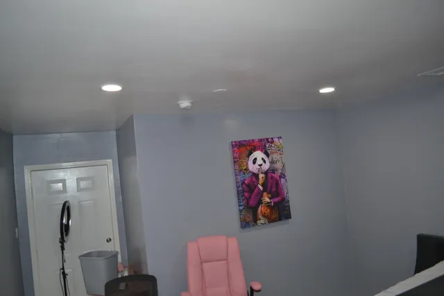 a kitchen with stainless steel appliances granite countertop a sink and cabinets