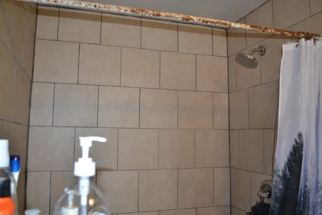 a view of a workspace with furniture