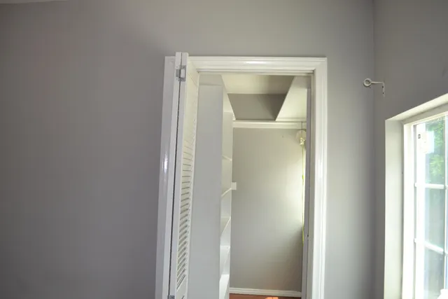 an aerial view of a house with outdoor space