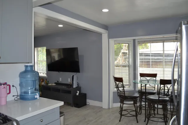 a living room with furniture and a window