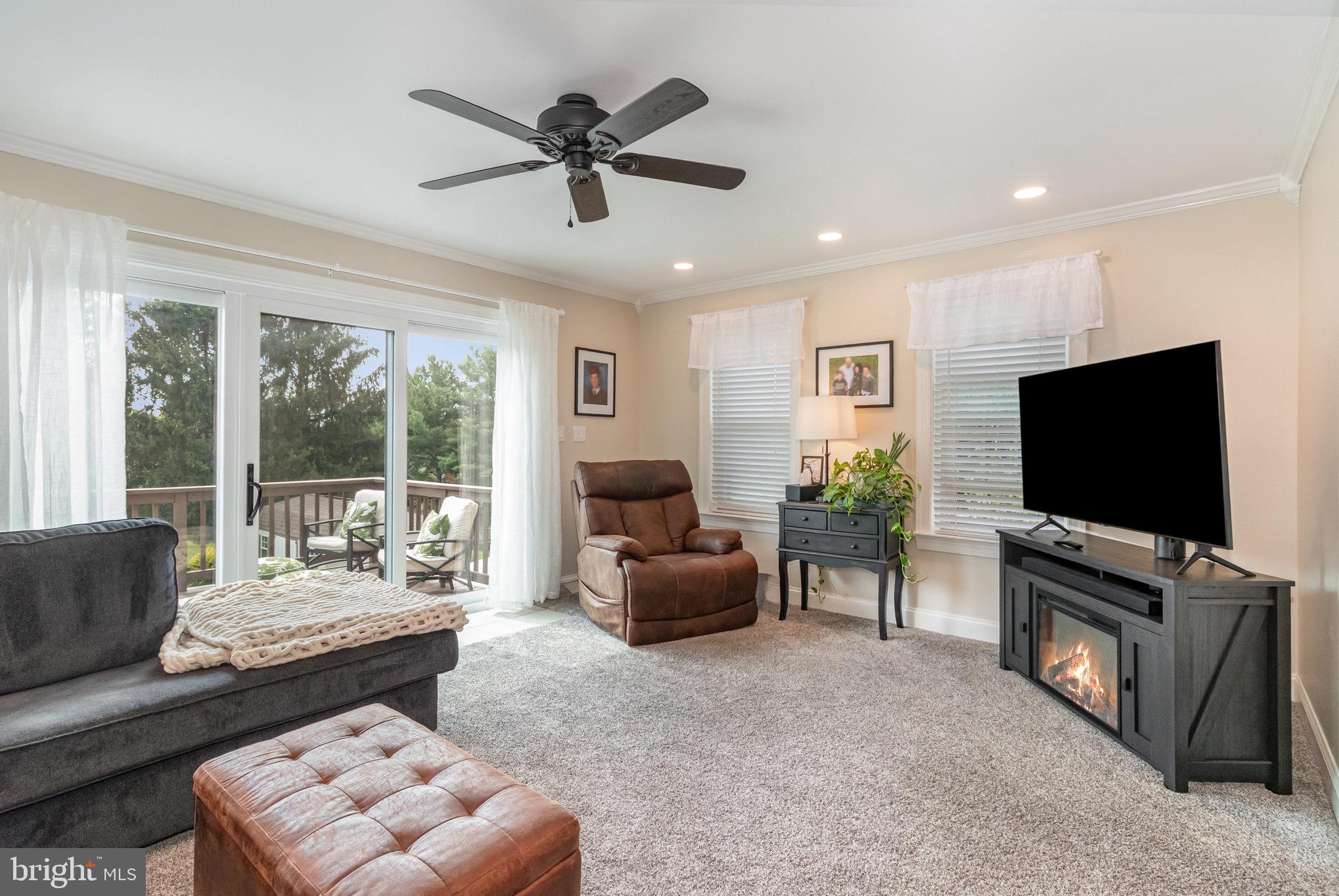 212 Weaver Drive Lititz, PA 17543 - Photo 13 of 44 a living room with furniture and a flat screen tv