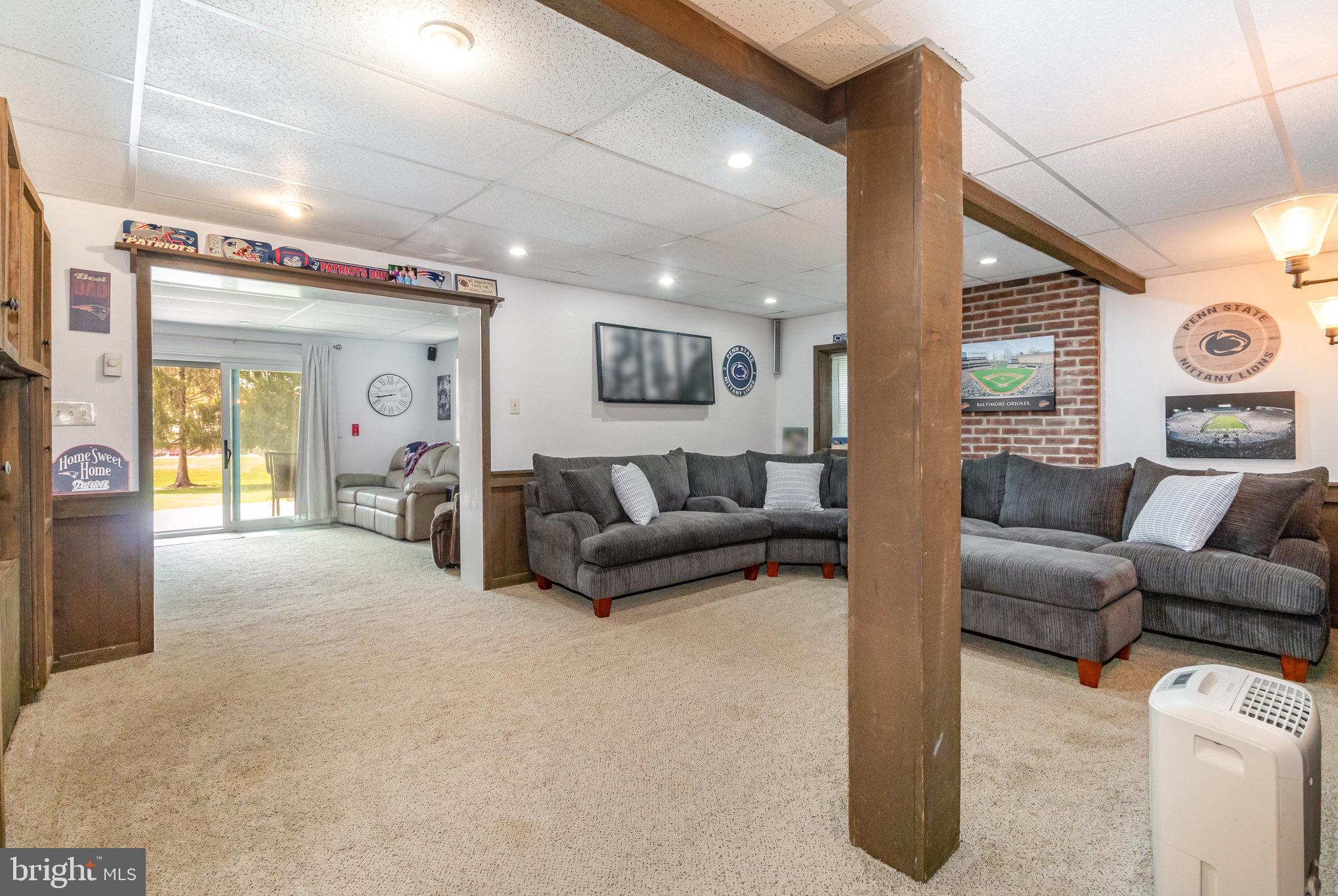 212 Weaver Drive Lititz, PA 17543 - Photo 25 of 44 a living room with furniture and a large window