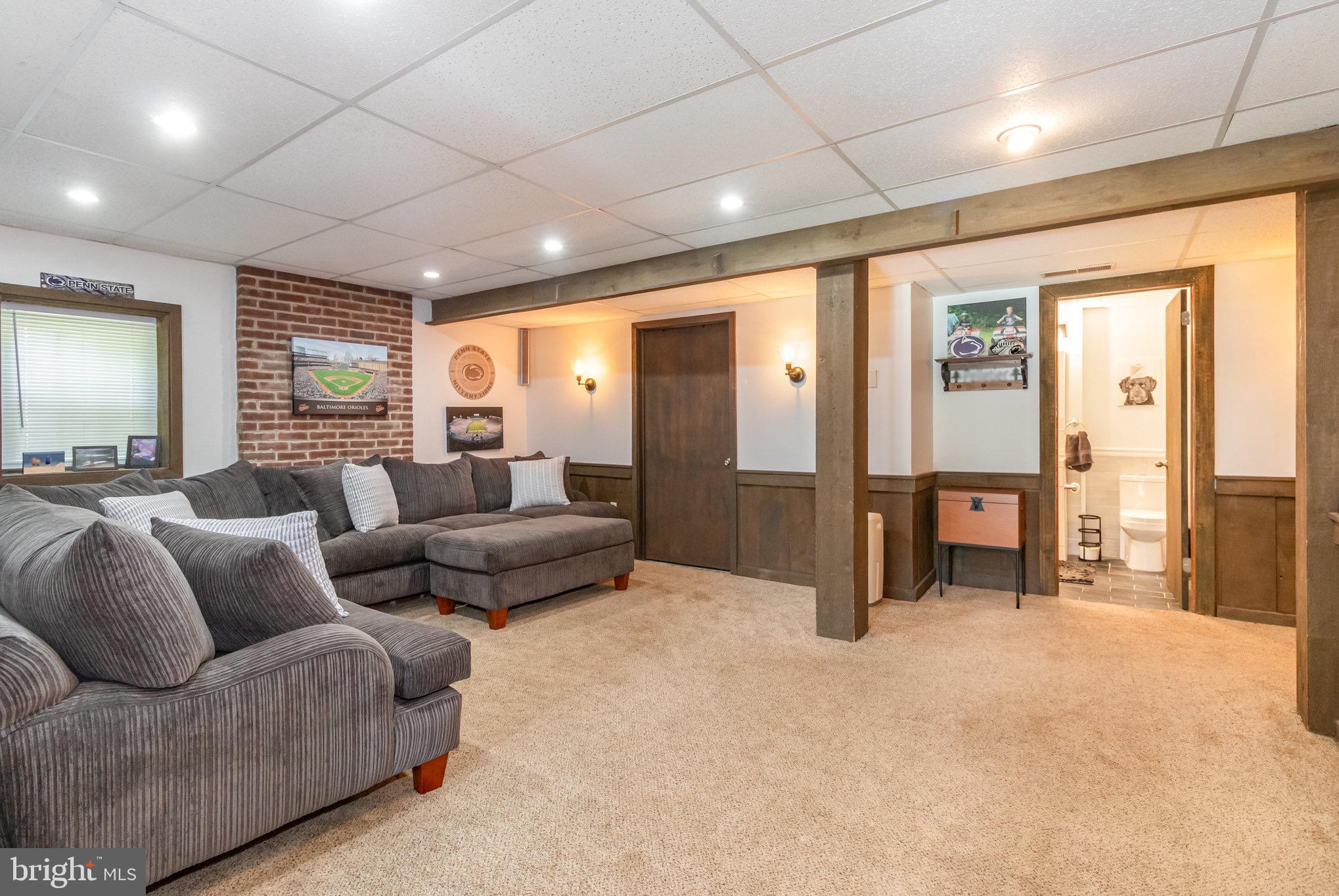 212 Weaver Drive Lititz, PA 17543 - Photo 26 of 44 a living room with furniture and a large window