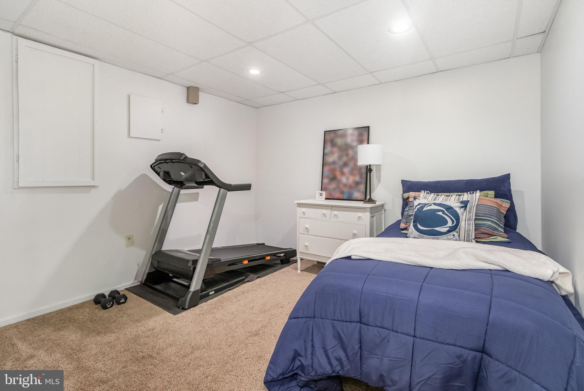 212 Weaver Drive Lititz, PA 17543 - Photo 29 of 44 a bedroom with a bed and a window