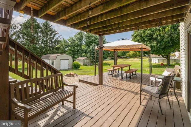 a view of porch with seating area
