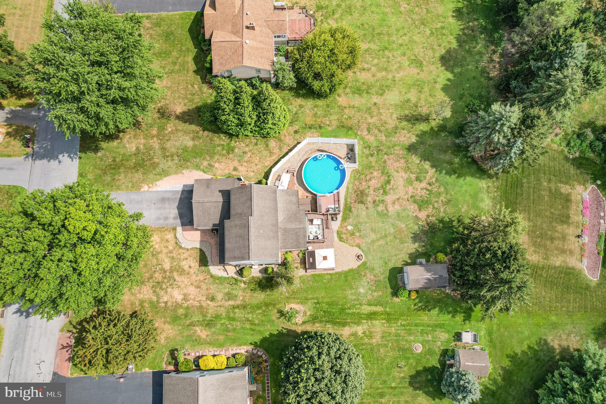 212 Weaver Drive Lititz, PA 17543 - Photo 41 of 44 a aerial view of a house with a yard and large trees