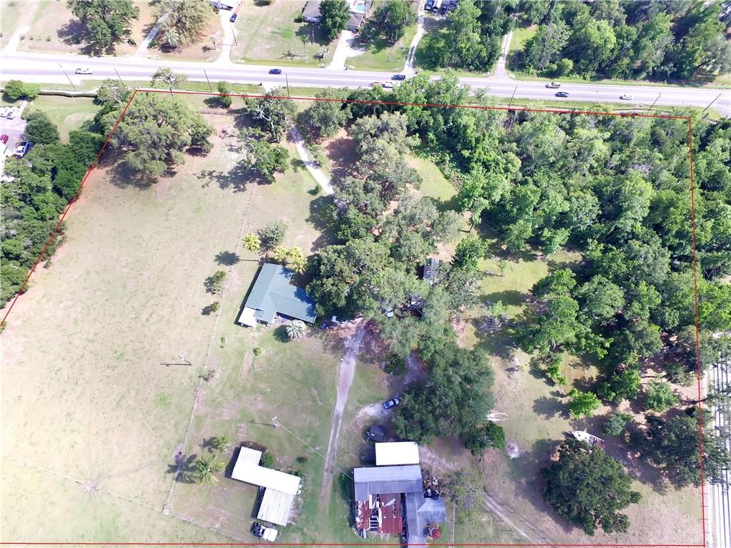 13030 Highway 92 Dover, FL 33527 - Photo 6 of 8 an aerial view of a houses with a yard
