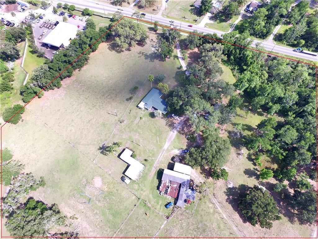 13030 Highway 92 Dover, FL 33527 - Photo 7 of 8 an aerial view of a house with a yard