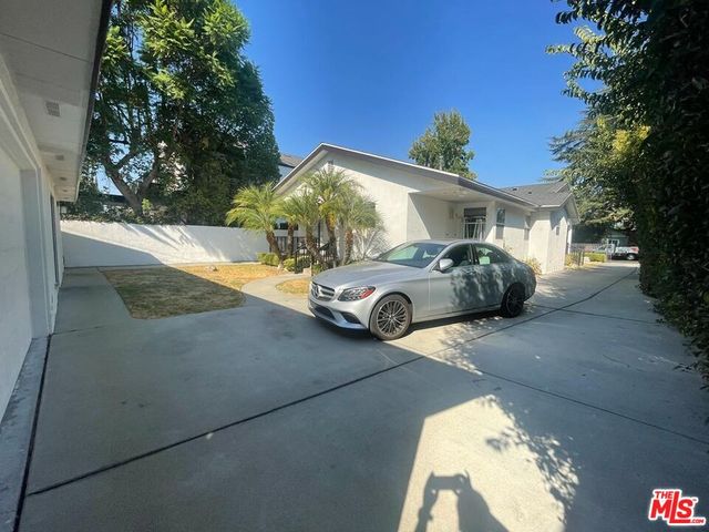 a view of swimming pool with outdoor seating