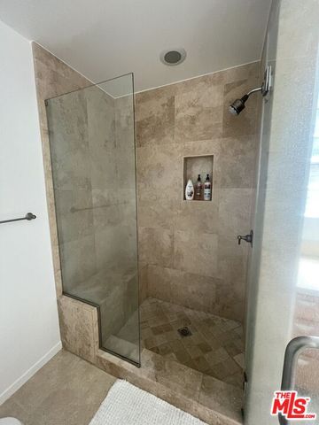 a room with a couch and a table in it