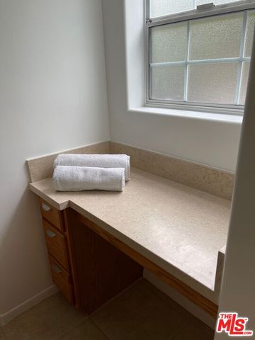 a bedroom with a bed and furniture