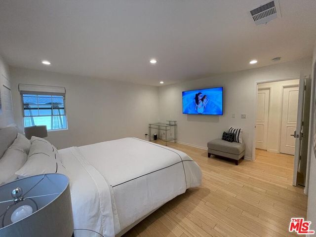 a stove top oven sitting inside of a kitchen