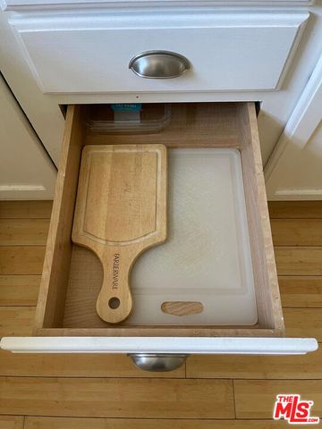 a view of water heater and shelf