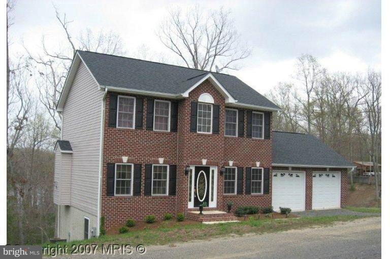 267 Red Cloud Road Lusby, MD 20657 - Photo 1 of 23 Classic brick-front colonial
