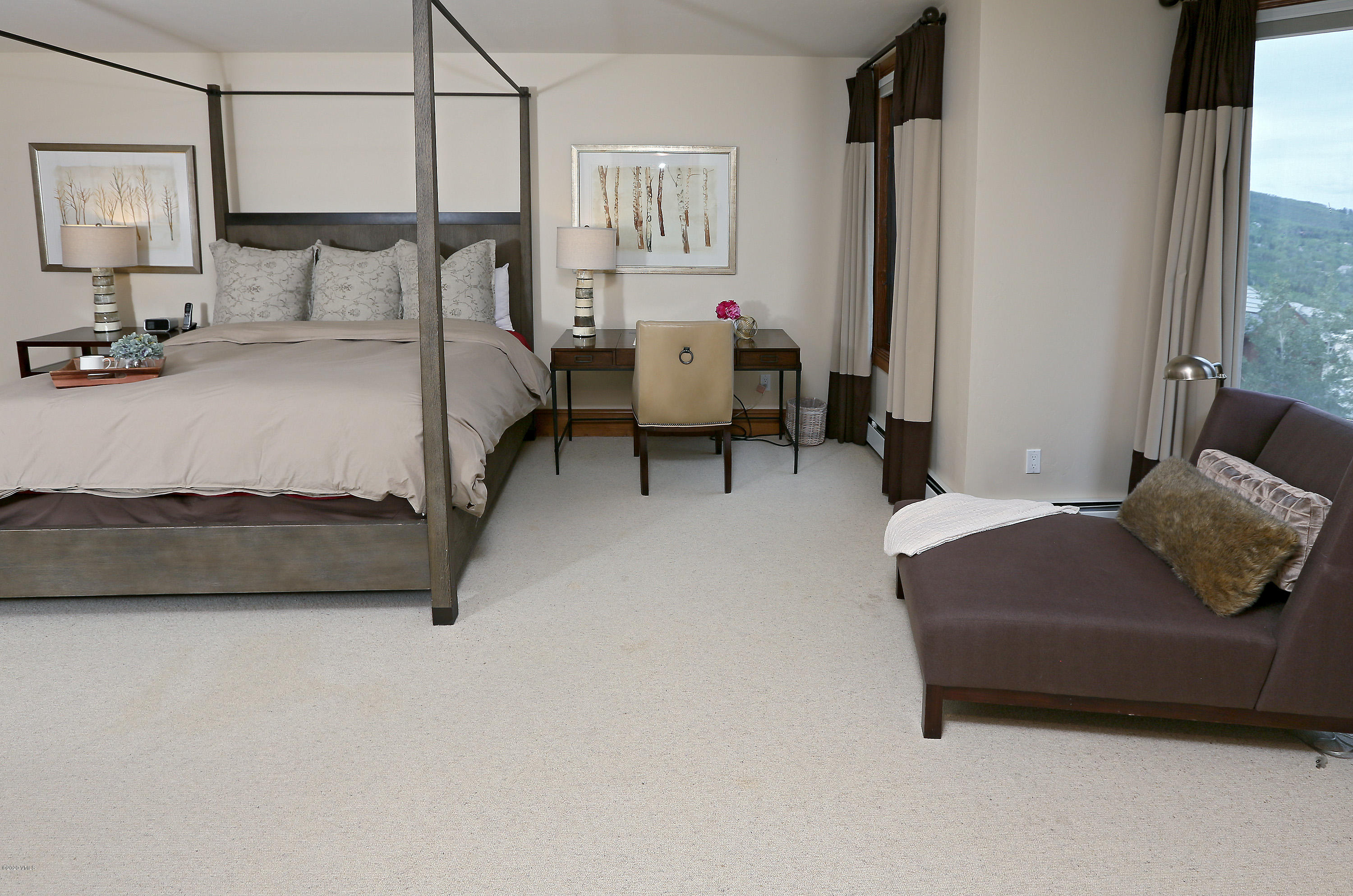 62 Highlands Lane, Unit R602 Beaver Creek, CO 81620 - Photo 13 of 30 a bedroom with a bed couch and a window