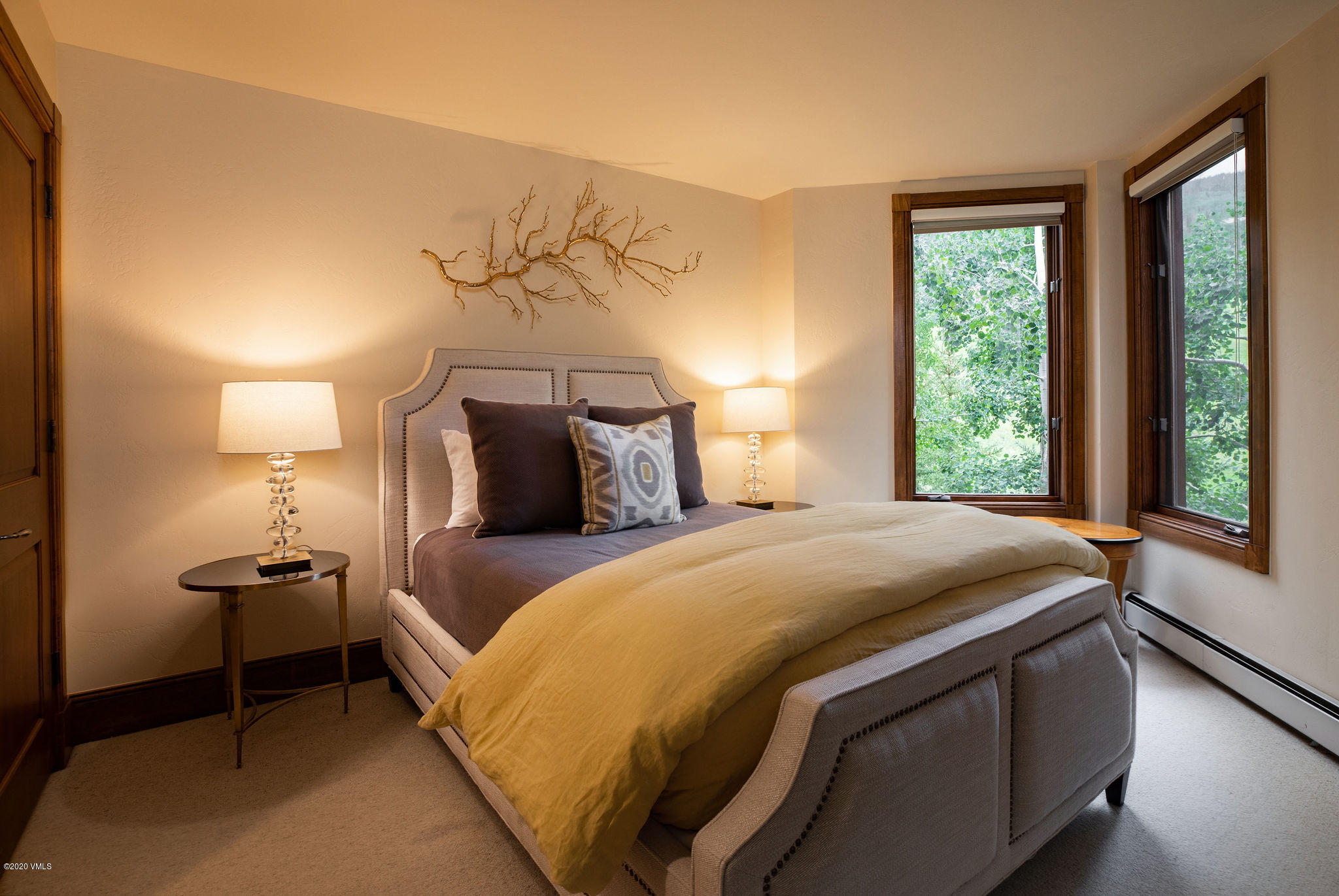 62 Highlands Lane, Unit R602 Beaver Creek, CO 81620 - Photo 15 of 30 a bedroom with a bed and a window