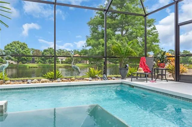 a view of a lake with a sitting area