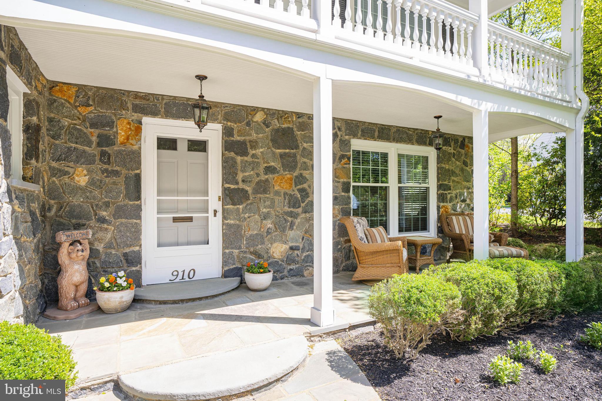 View of covered porch and balcony