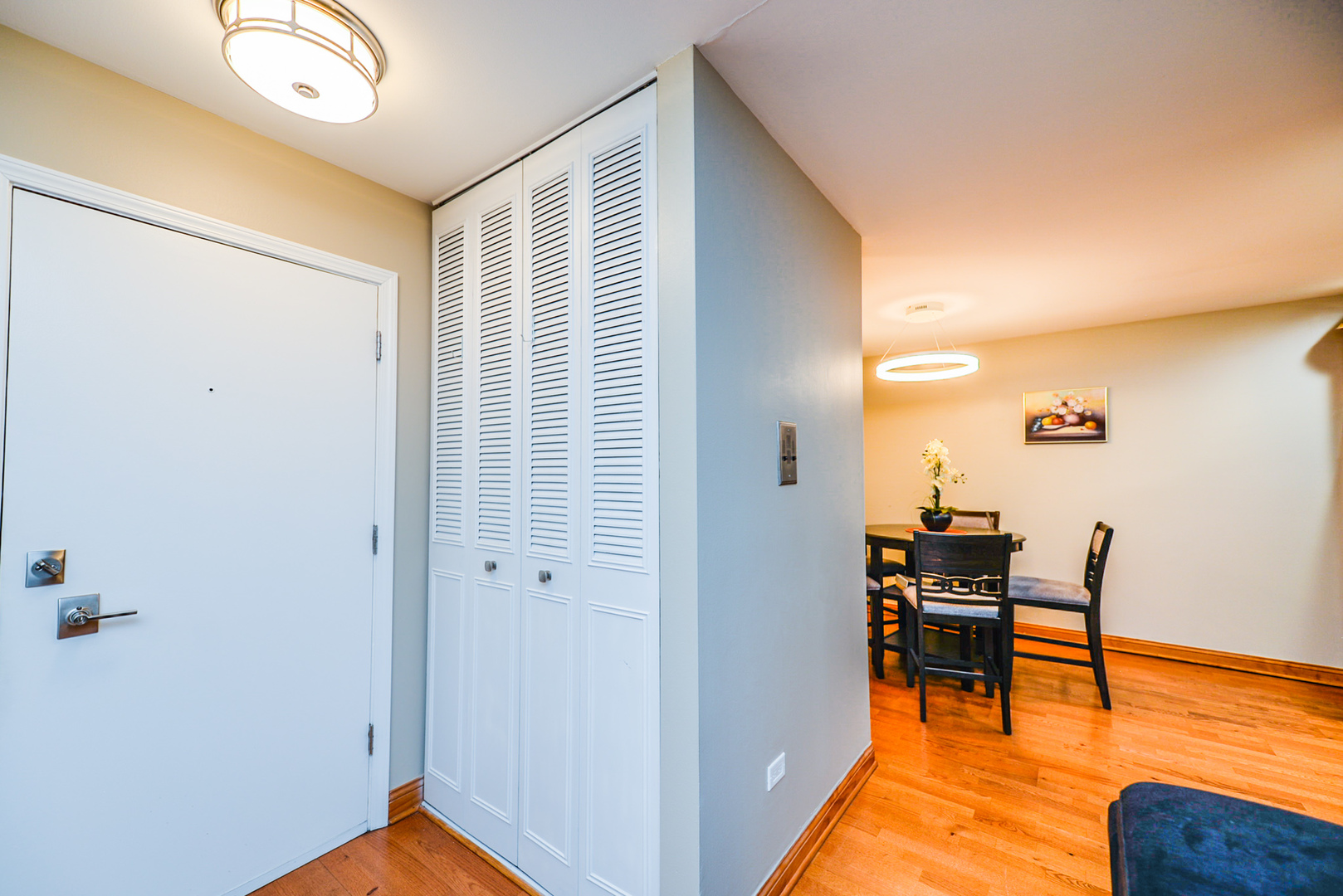 280 North Westgate Road, Unit 128 Mount Prospect, IL 60056 - Photo 13 of 29 a view of a room with furniture and wooden floor