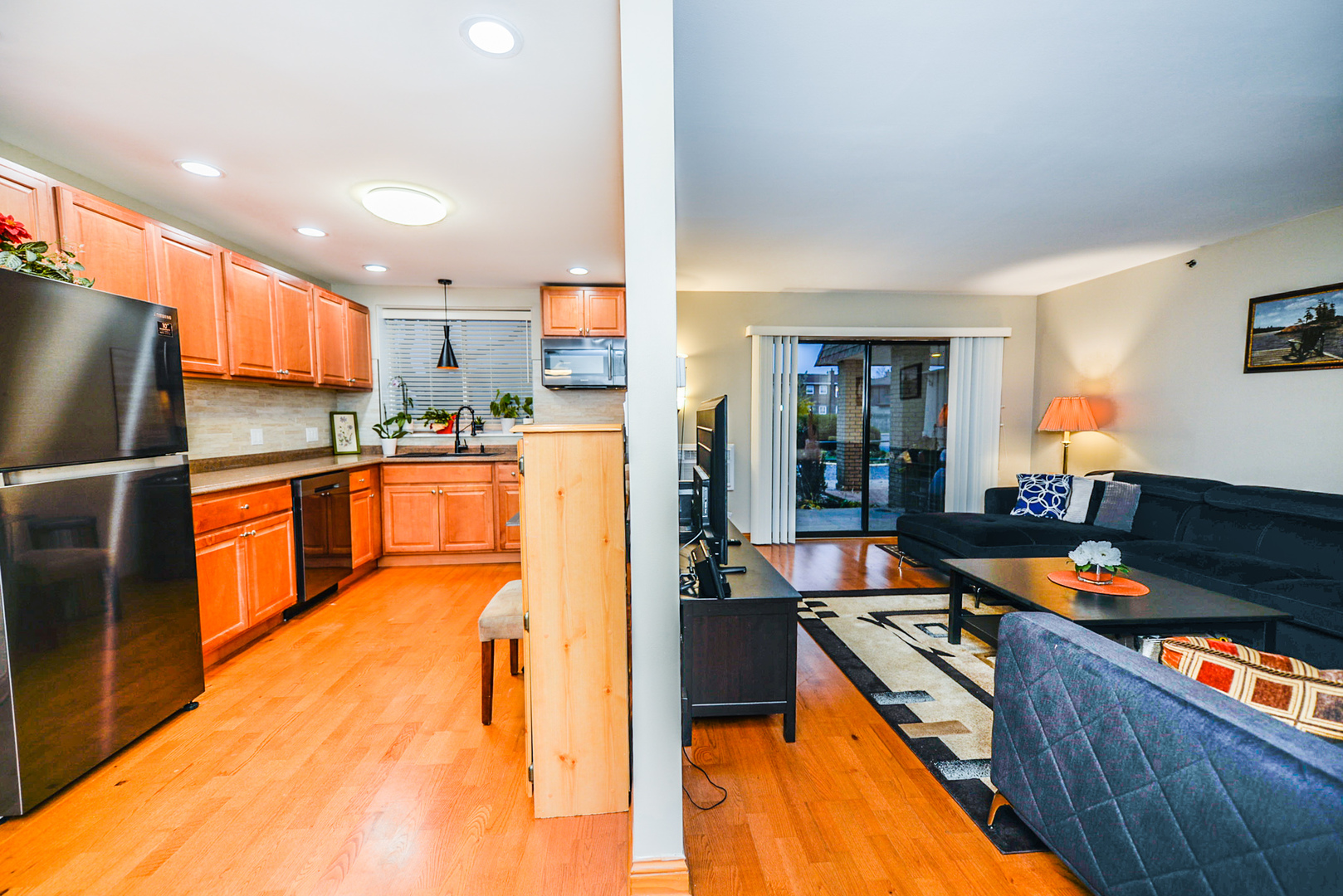 280 North Westgate Road, Unit 128 Mount Prospect, IL 60056 - Photo 5 of 29 a kitchen with stainless steel appliances granite countertop a refrigerator a stove and a sink