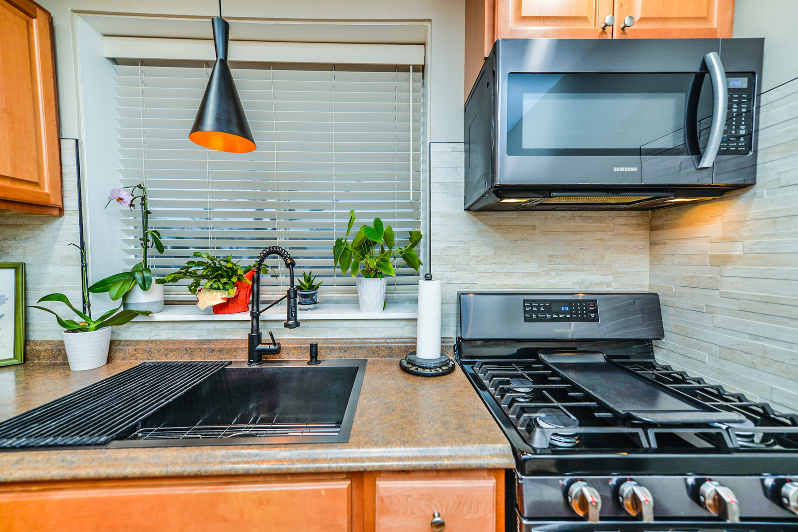 280 North Westgate Road, Unit 128 Mount Prospect, IL 60056 - Photo 10 of 29 a kitchen with a stove and a microwave