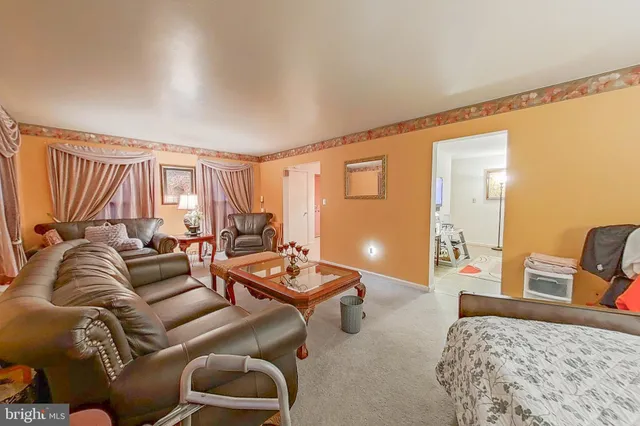 a living room with furniture and a couch