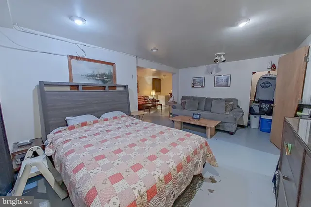 a living room with furniture and a table