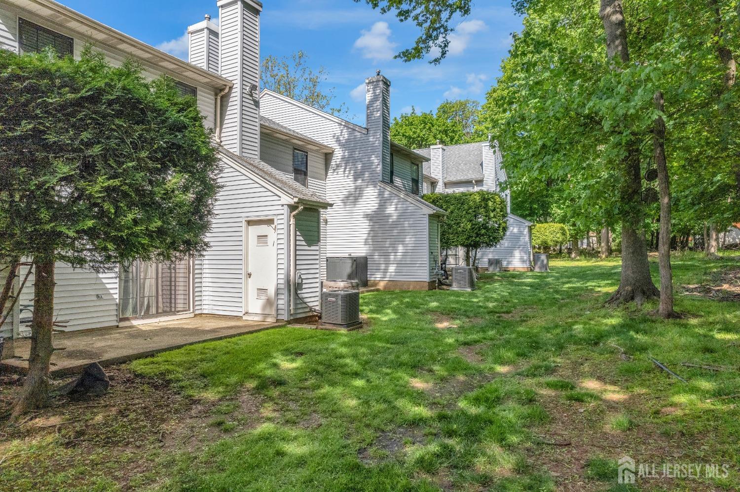 1405 Maplecrest Road Edison, NJ 08820 - Photo 30 of 33 a front view of a house with a yard