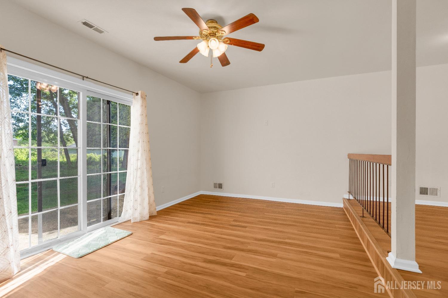1405 Maplecrest Road Edison, NJ 08820 - Photo 7 of 33 a view of an empty room with a window