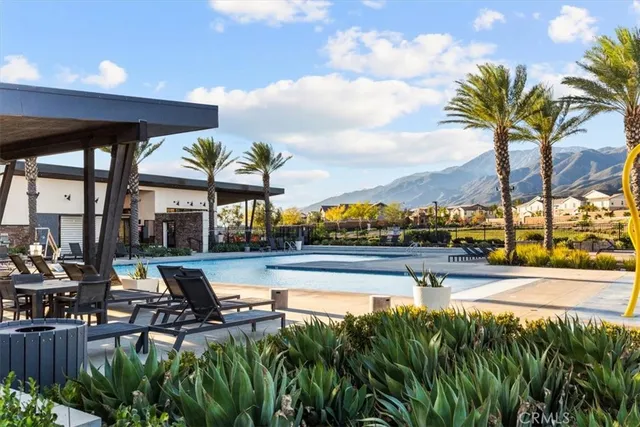 a view of yard with swimming pool and patio